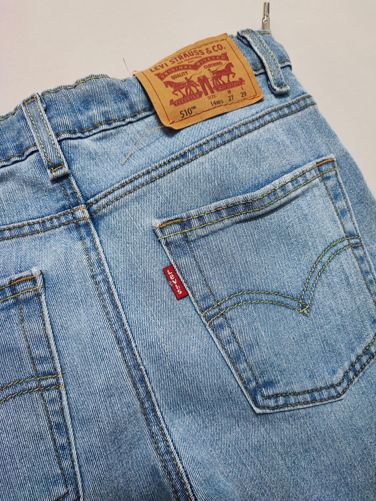 Vintage Levi's 510 Skinny Jeans Faded Blue Ripped Knee Youth Kids W27 L29