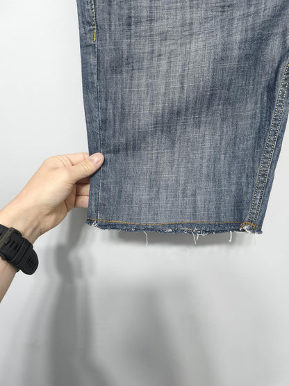 Vintage Levi's 511 Slim Fit Mid Blue Raw Hem Denim Shorts 90s Skater Grunge Jorts W34