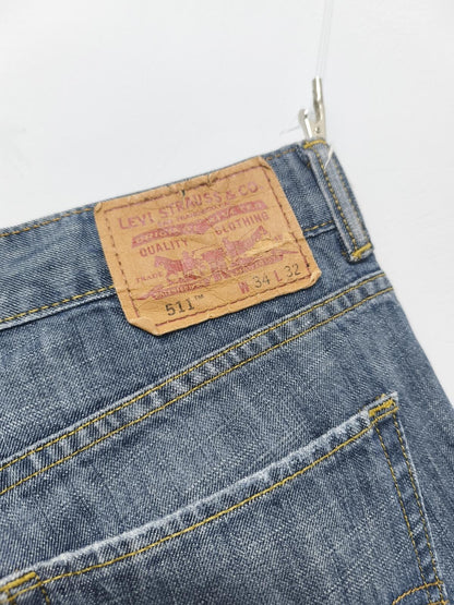 Vintage Levi's 511 Slim Fit Mid Blue Raw Hem Denim Shorts 90s Skater Grunge Jorts W34