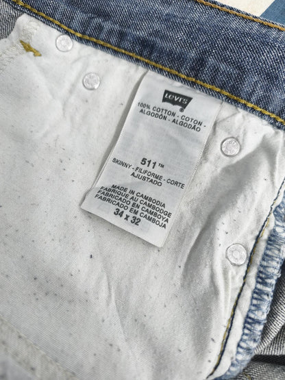 Vintage Levi's 511 Slim Fit Mid Blue Raw Hem Denim Shorts 90s Skater Grunge Jorts W34