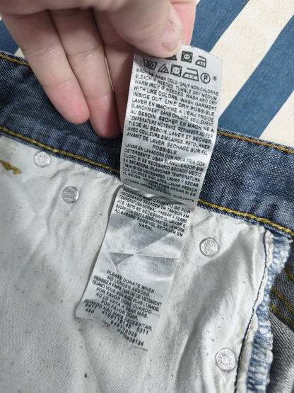 Vintage Levi's 511 Slim Fit Mid Blue Raw Hem Denim Shorts 90s Skater Grunge Jorts W34